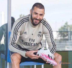 Karim Benzema with Boot in hand