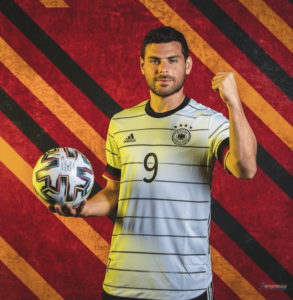 Kevin Volland in German Jersey with a Football in hand