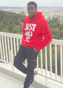 Moussa Wagué in Red Jacket