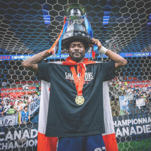 Tosaint Ricketts with trophy ih head