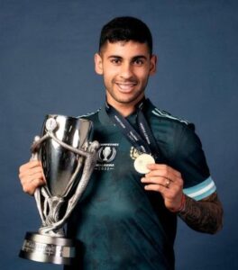 Cristian Romero With a Trophy