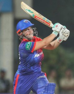 Alice Capsey bat in hand